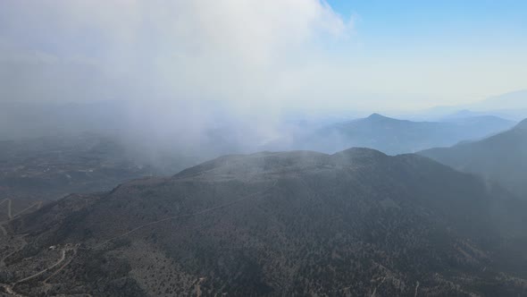 Drone aerial footage clouds/mountains