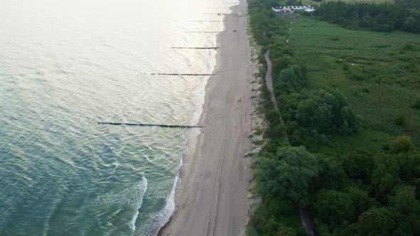 Aerial View of Sea Landscape with Waves and Sand Beach alt