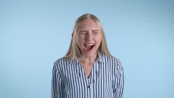 Pretty Blonde Girl Shouting Loudly alt