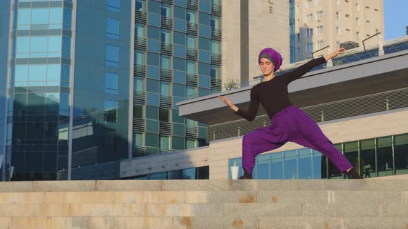 Strong Young Calm Muslim Islamic Woman in Hijab Girl Yogi Sportswoman Lady Female Trainer Doing Yoga alt