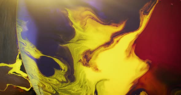 Abstract colors dissolving in water creating psychedelic effect. Liquid color macro concept.  alt
