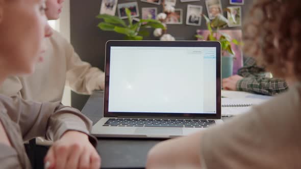 Multiethnic Friends Sitting on Couch Having Online Videocall Meeting Socialising with Virtual alt