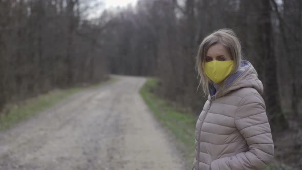 Woman in Yellow Protective Mask, Quarantine
