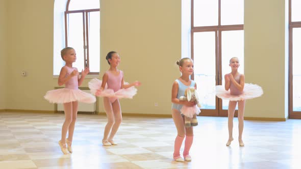 Adorable Class of Young Ballerinas at a Rehearsal