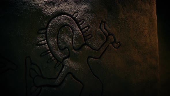Passing Old Rock Carving Of Space Man - Ancient Visitors Concept alt