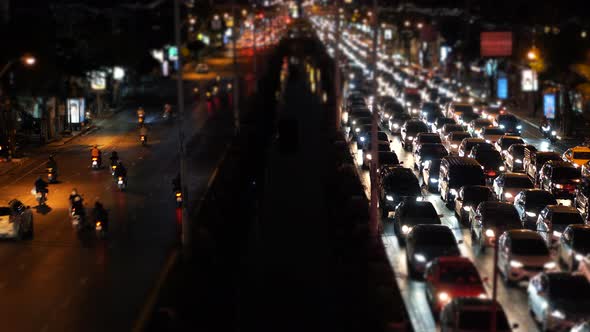 Time-Lapse a Huge Traffic Jam on The Busy Avenue at Night Time Rush Hour