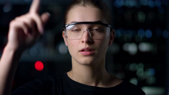 Successful Pretty Girl Wearing VR Glasses Indoors alt