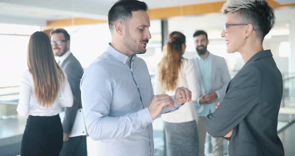 Picture of Architects Talking About Project in Hall alt