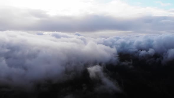Amazing Aerial Shot Drone Flying Over Fluffy Blue and White Clouds alt