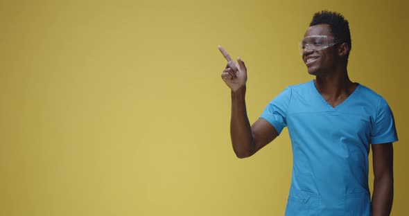 Young Doctor Pointing Right alt