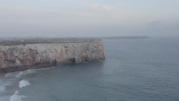 Astonishing Aerial View Panorama of Amazing Lagos Algarve Rocky Cliff Coastline Portugal Dolly in alt