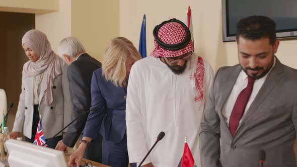 Foreign Politicians Taking Their Seats at Press Conference alt