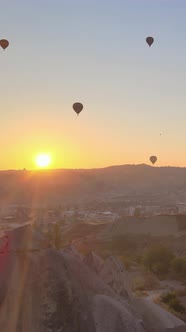 Vertical Video of Hot Air Balloons Flying in the Sky Over Cappadocia Turkey alt