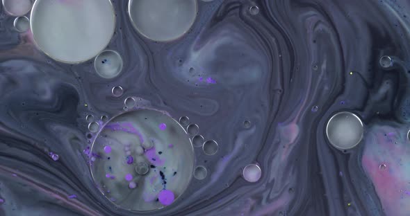 Abstract Psychedelic Background. Slow Movement of Ink in a Multicolored Liquid alt