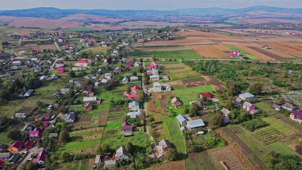 Flight over the houses in the Ukrainian village Aerial view.