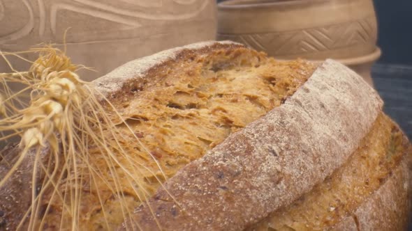 Closeup of Fresh Baked Whole Grain Bread Move in Slow Motion alt