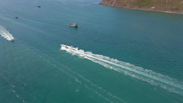 Aerial Shot of Big Boats with Tourists Ride on the Sea. Concept of Sea Vacations. Summer Trip alt