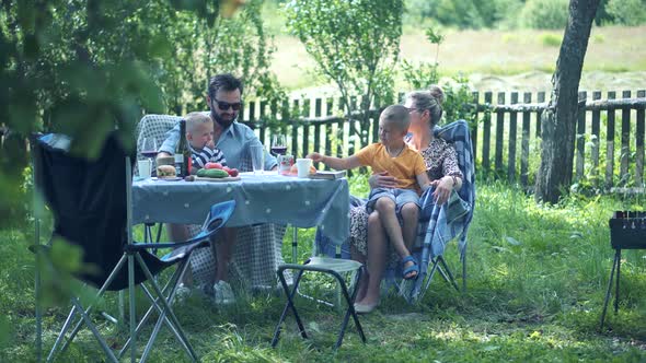 Family Mother, Father And Child Boys Leisure. Son Boys Walking Happiness. Little Kid Having Fun Mom. alt