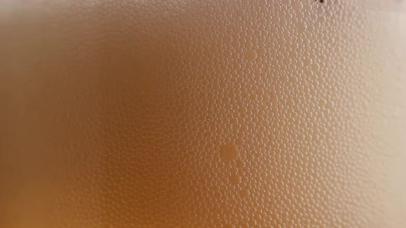 Bubbles formed in Beer glass, Extreme macro in 4K alt