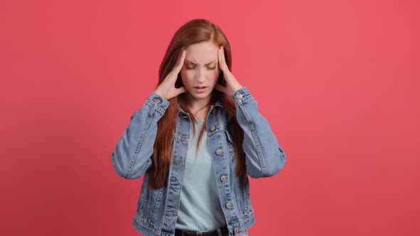 Headache. Young Woman Feeling Pain, Holding Her Head with Hand. alt