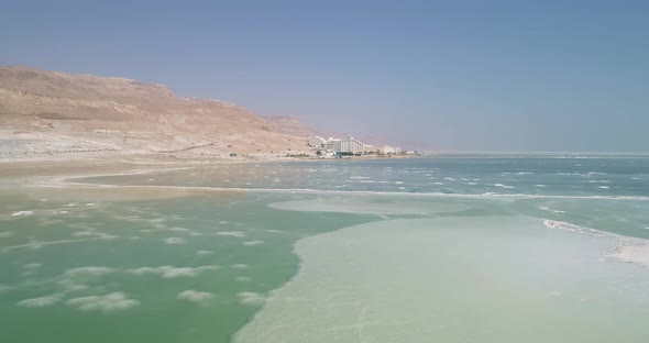 Aerial view of colourful sinkholes. The Dead sea, Negev, Israel. alt