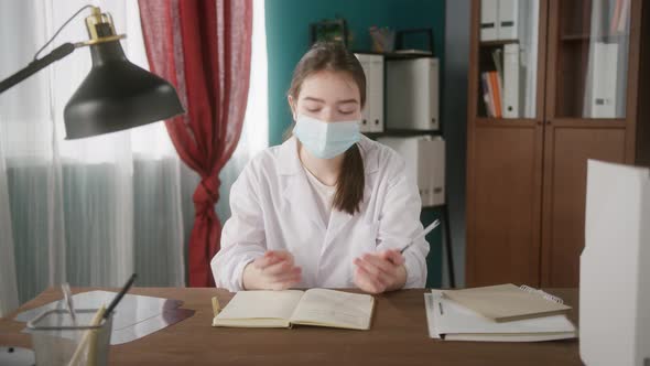 Medical Student is Using Online Video Conference for Remote Learning alt