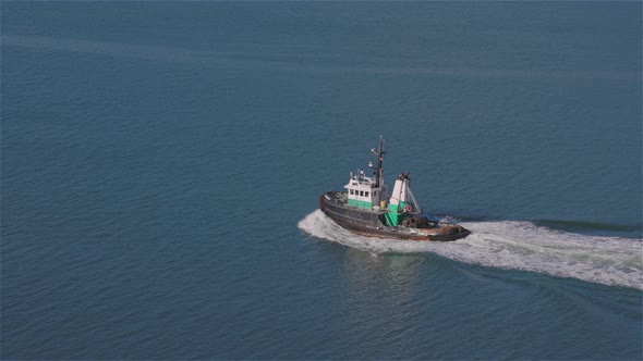 Industrial Tugboat Pulling a Load in Burrard Inlet alt