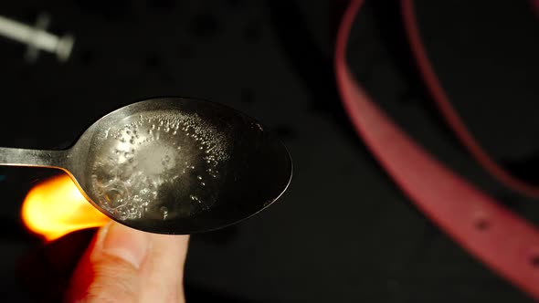 Drug is prepared in a spoon