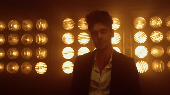 Sexy Guy Posing Snapping Fingers in Nightclub Closeup alt