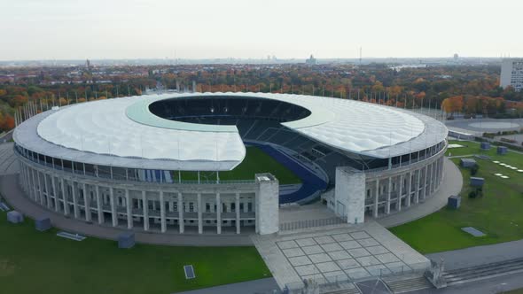 Empty Olympic Stadium with No People on Beautiful Blue Sky Day, Slow Scenic Wide Establishing Shot alt