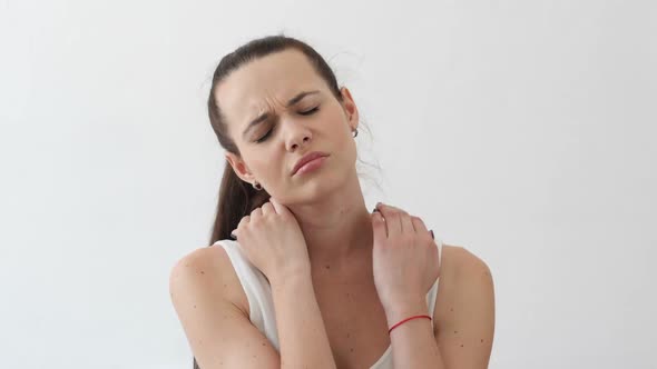Tired Woman Relaxing Her Neck Muscles at Work Portrait alt