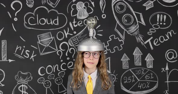 Funny girl wearing handmade helmet with lightbulb alt