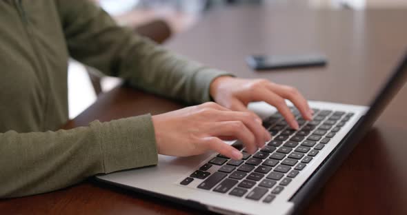 Woman work on computer at home alt