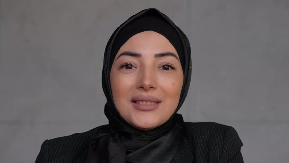 Close Up Portrait Middle Eastern Young Muslim Woman Wearing Hijab Looking at Camera and Smiling