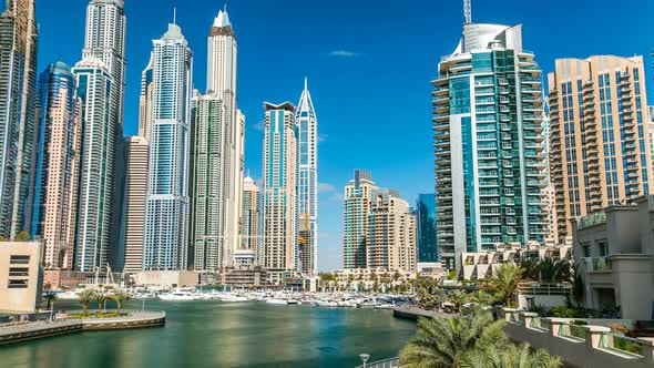 View of Dubai Marina Modern Towers in Dubai at Day Time Timelapse alt