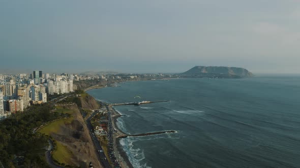 Aerial view of Lima's Coastline Pacific ocean coast, city capital in Peru 4K