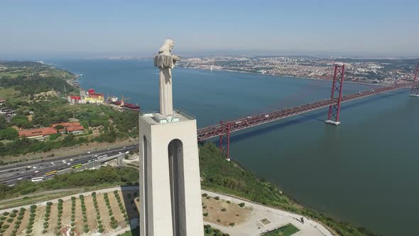 Aerial shot of Christ the King statue and Ponte 25 De Abril