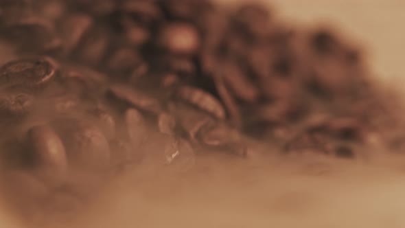 Fragrant Coffee Beans Are Roasted in a Frying Pan, Smoke Comes From Coffee Beans. alt