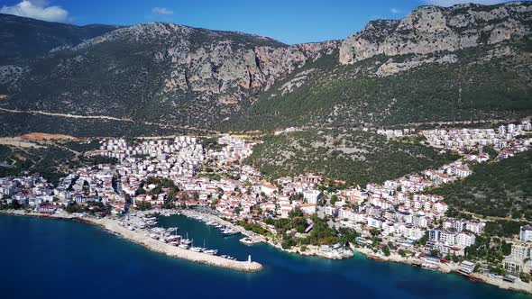 The top view from the drone of Kas resorts, bay, yahts, city in Mugla in Turkey