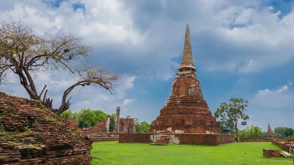 4k Time-lapse panning of Ruins of Wat Mahathat temple in Ayutthaya historical park, Thailand
