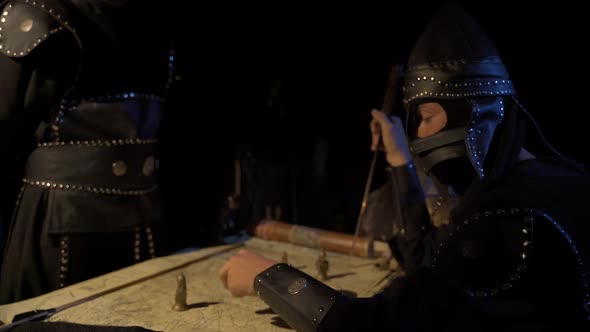 Soldier doing war tactic with sword in hand. alt