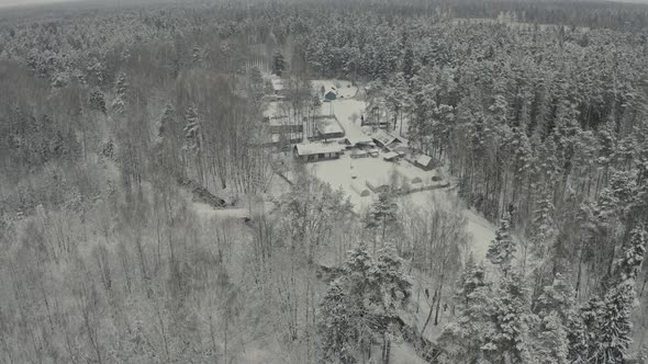 Winter Landscape of a Russian Village in the Forest