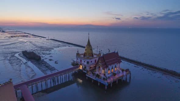 Time lapse of aerial view of Wat Hong Thong with lake or sea, Chachoengsao near Bangkok alt