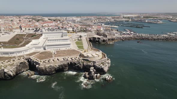 Peniche fortress and cityscape, Portugal. Aerial orbit