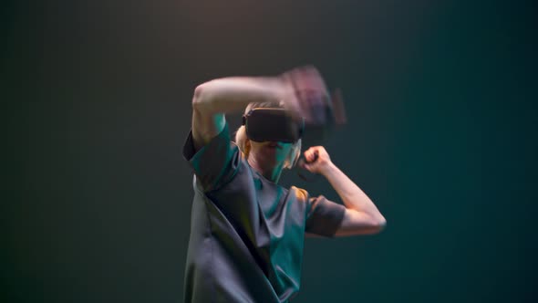 Closeup Man Playing Virtual Game Using Invisible Sword alt