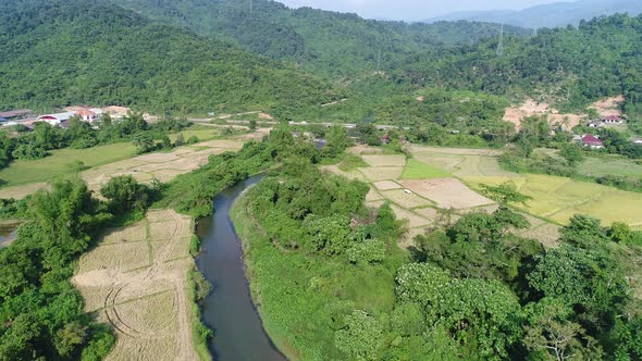 Natural landscapes around the city of Vang Vieng in Laos seen from the sky alt