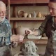 Young Woman Learning Clay Sculpting with Senior Potter - VideoHive Item for Sale