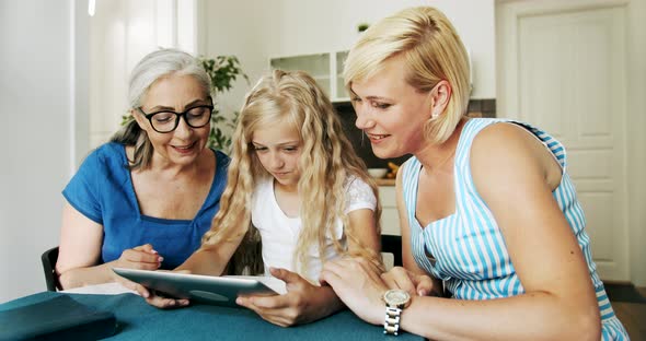 Three Generations Women with Tablet