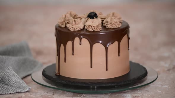 Delicious Chocolate Cake on Rotating Cake Stand