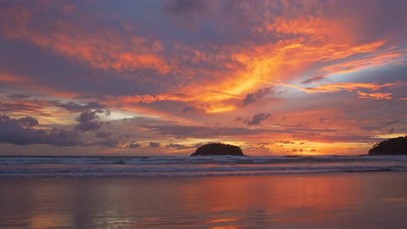 Stuning Orange Cloud In Sunset Above Pu Island At Kata Beach. alt